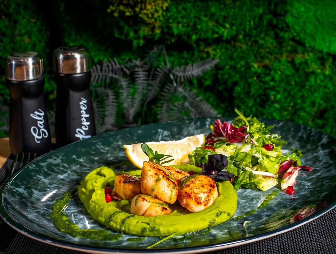 Hand-dived scallops, pea purée and salsa verde